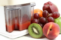 juicer and fresh fruit