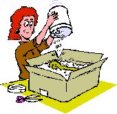 lady packing away items in a cardboard box