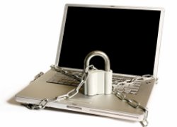 open laptop with padlock attached