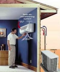man checking air conditioner