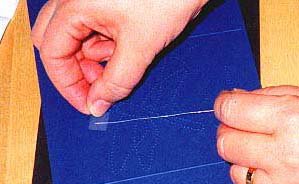 illustraton of how to attach thread to back of card